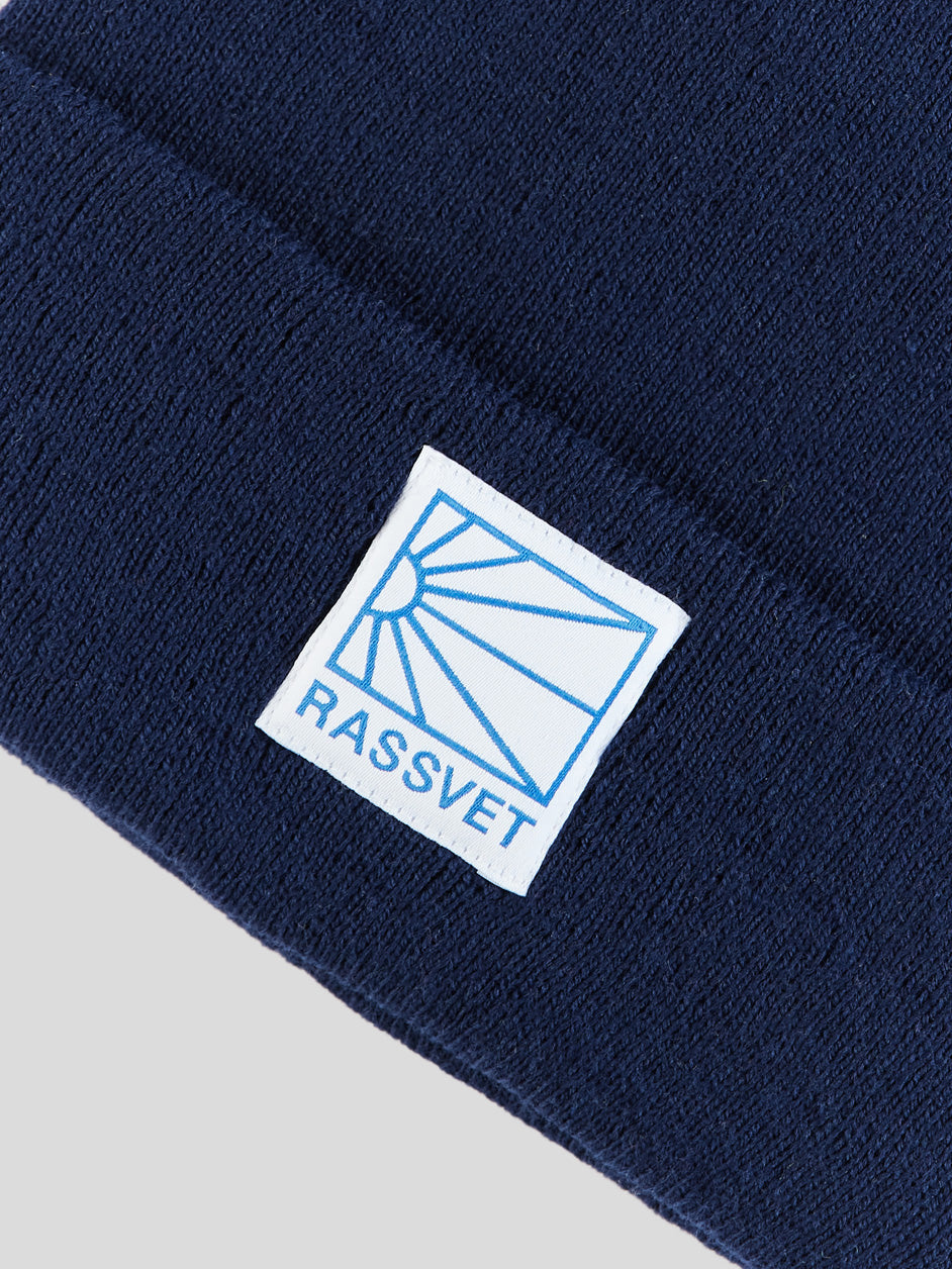 Rassvet Paccbet clothing navy-men-rassvet-logo-tag-beanie